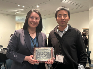 Kelly Yang (left) with her mentor Daniel Xu and her award