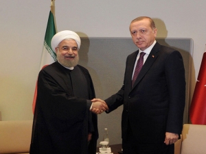Erdogan and Rouhani shaking hands
