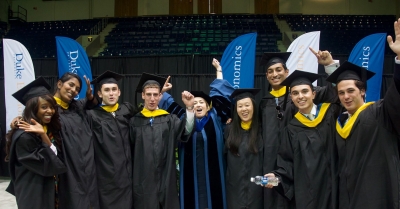 Duke Economics honors program students and Professor Michelle Connolly at the department's commencement ceremony in 2017.