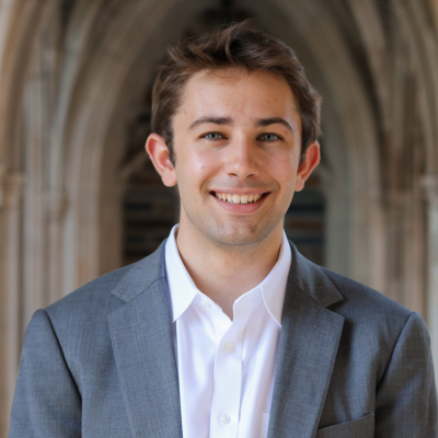 Headshot of Thomas Schaefer '22 with Duke Chapel arches in background